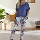 Set din două piese pentru femei - top de culoare solidă și pantaloni casual imprimați