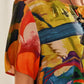 Rochie fluidă în culori tropicale strălucitoare
