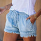 Pantaloni scurți din denim cu franjuri și cordon cu talie înaltă